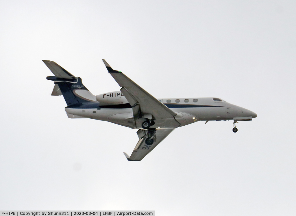 F-HIPE, 2010 Embraer EMB-505 Phenom 300 C/N 50500016, Landing rwy 33... Taking from a supermarket against the sun :/
