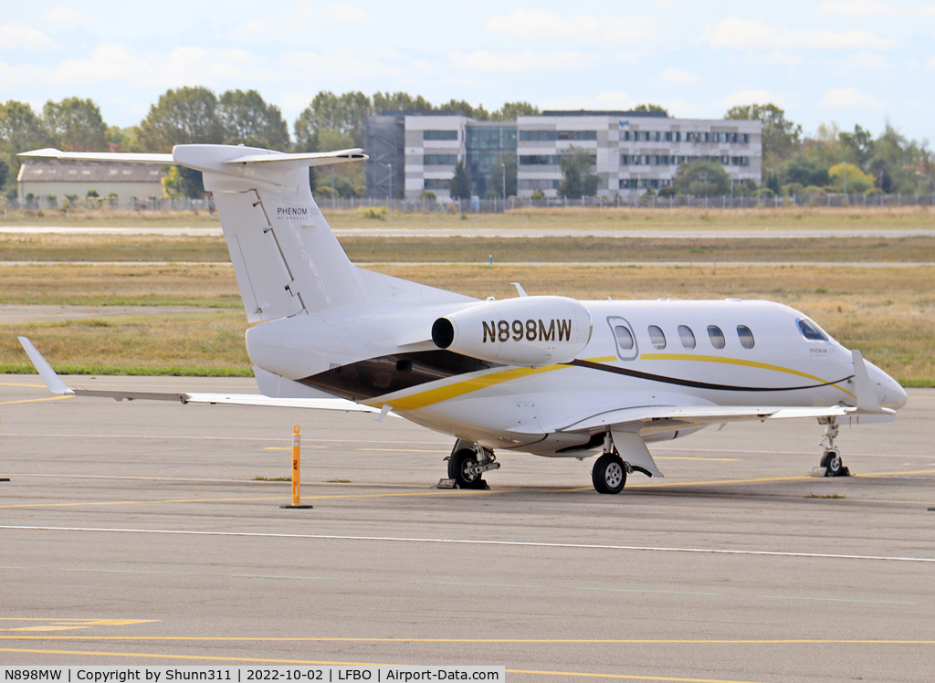 N898MW, 2011 Embraer EMB-505 Phenom 300 C/N 50500048, Parked at the General Aviation area..