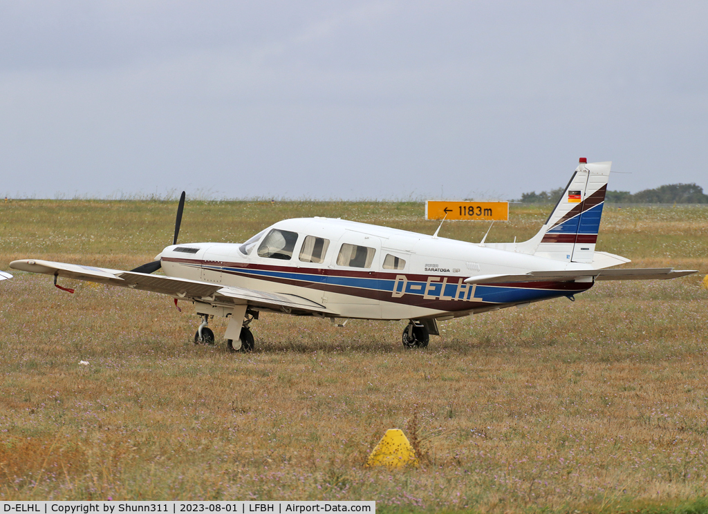 D-ELHL, 1984 Piper PA-32R-301T Turbo Saratoga C/N 32R-8429013, Parked in the grass...