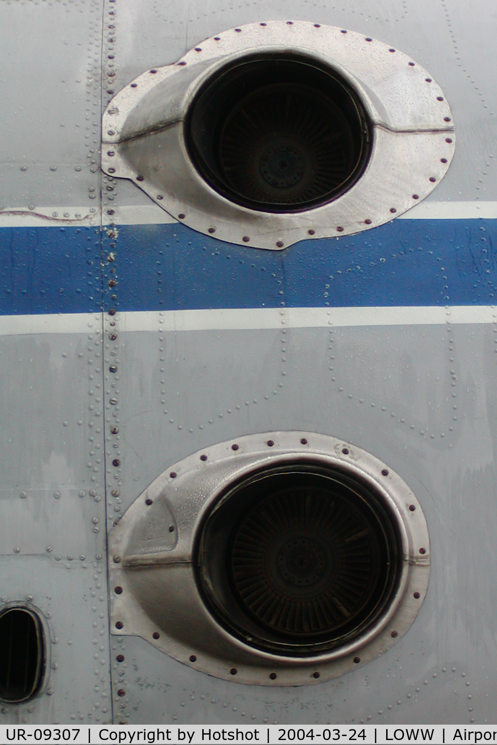 UR-09307, 1974 Antonov An-22A C/N 043481244, Air exhausts on the right side above the gear bulges