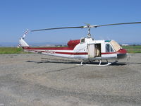 N843M @ 07CL - Av Ag Inc. 1963 Bell UH-1B (63-8676) rigged as sprayer at their Richvale, CA base - by Steve Nation