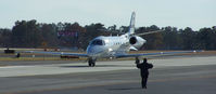 N547CS @ PDK - Being directed to parking at Mercury Air Service - by Michael Martin