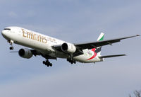 A6-EMV @ LHR - Emirates Boeing 777-300 landing at London Heathrow Airport, England - by Adrian Pingstone