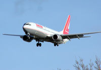 OE-LNJ @ LHR - Lauda Air Boeing 737-800 landing at London (Heathrow) Airport - by Adrian Pingstone