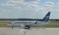 C-GRWS @ YOW - One of West Jet's many B737-700 in Canada's Capital - by Micha Lueck
