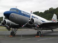 N814CL @ BFI - This DC-3 of Clay Lacy Aviation is painted in United colors and is a popular guest at airshows and other aviation arrangements.  Here on display at the Boeing Field Museum of Flight, May 2004. - by Andreas Mowinckel