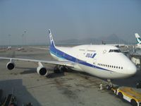 JA405A @ HKG - ANA's B747-400 seconds before push-back in Hong Kong - by Micha Lueck