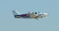 N4455B @ PDK - Gear up after take off from 20L - by Michael Martin