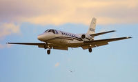 N568WC @ KAPA - On short finals at APA - by Ben Remy