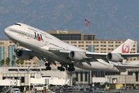 JA8076 @ LAX - JA8076 departing RWY 25R on a clear January afternoon. - by Dean Heald