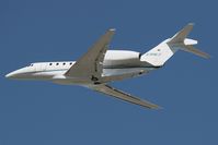 N704LX @ LAX - Target Corporation N704LX - Cessna 750 Citation X - departing LAX RWY 25R. - by Dean Heald