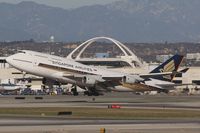 9V-SPL @ LAX - Singapore Airlines - 9V-SPL (747-412) departing LAX RWY 25R. - by Dean Heald