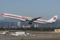 B-6052 @ LAX - China Eastern B-6052 departing LAX RWY 25R. - by Dean Heald