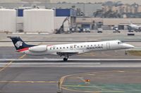 XA-BLI @ LAX - Aerolitoral XA-BLI touching down on RWY 7R. - by Dean Heald