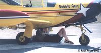 N330DG @ ILM - Debbie Gary checking things out before her routine.  Got to appreciate the hands on pilots - by Paul Perry