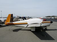 N5577Q @ AUN - 1965 Mooney M20C with cover at Auburn Municipal Airport, CA.  Substantially damaged September 20, 2006 when acft lost elevator flight control at lift-off and pilot made hard forced landing on runway. - by Steve Nation