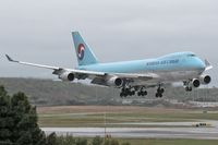 HL7449 @ LAX - Korean Air Cargo HL7449 nearing touchdown on RWY 7R on a rainy day. - by Dean Heald
