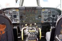 9G-LCA @ BOH - CL-44 FLIGHT DECK - by barry quince