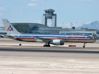 N709TW @ KLAS - American Airlines / 1997 Boeing 757-2Q8 / McCarran ATCT in background - by Brad Campbell