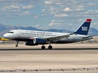 N819AW @ KLAS - US Airways / 2000 Airbus Industrie A319-132 / Landing RWY 25L - by SkyNevada - Brad Campbell