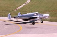 N961GP @ DPA - Twin Beech with a nose job, taxing by the control tower - by Glenn E. Chatfield