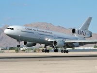 N720AX @ KLAS - Omni Air International /  Mcdonnell-douglas DC-10-30 - Landing RWY 25L - by Brad Campbell