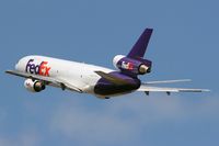 N562FE @ LAX - FedEx N562FE (FLT FDX3019) climbing out from RWY 25L enroute to Chicago Ohare Int'l (KORD), Illinois. - by Dean Heald