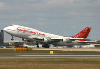 TF-AME @ EGCC - Travel City's old 747 off to Florida from 24R. - by Kevin Murphy