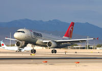 N319US @ LAS - Touching down in the early evening - by Kevin Murphy