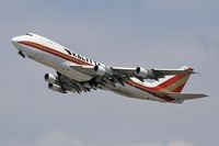 N704CK @ LAX - Kalitta Air N704CK (FLT CKS523) climbing out from RWY 25L enroute to McConnell AFB (KIAB). - by Dean Heald