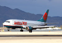 N305AW @ LAS - Great light for this 737. - by Kevin Murphy