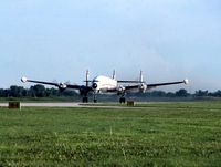 N6937C @ DPA - Departing the show, on the take-off roll - by Glenn E. Chatfield