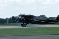 N11170 @ KOSH - Taking the runway at the EAA Fly In - by Glenn E. Chatfield