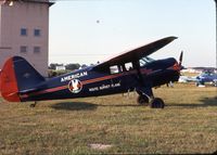N18407 @ KDPA - Parked at the base of the tower.  The pilot was investigating storm-damaged airplanes - by Glenn E. Chatfield