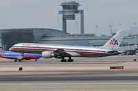 N702TW @ LAS - American Airlines N702TW (FLT AAL1538) departing RWY 25R en route to Dallas/Fort Worth Int'l (KDFW). - by Dean Heald