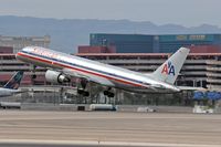 N702TW @ LAS - American Airlines N702TW (FLT AAL1538) departing RWY 25R en route to Dallas/Fort Worth Int'l (KDFW). - by Dean Heald