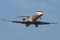 C-GJAZ @ LAX - Air Canada Jazz C-GJAZ (FLT JZA8529), originating from Edmonton Int'l (CYEG), on final approach to LAX RWY 24R. - by Dean Heald