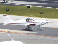 N77SX @ PDK - Taxing to 20R - by Michael Martin