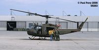 69-15263 @ NCA - The Huey.  Note the old-style upturned exhaust, and the single engine - by Paul Perry