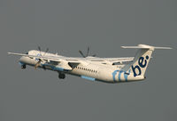 G-JECJ @ EGCC - Flybe Dash 8 leaving 06L. - by Kevin Murphy