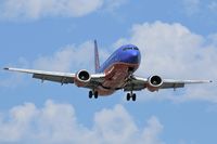 N304SW @ LAX - Southwest Airlines N304SW (FLT SWA982) from Las Vegas McCarran Int'l (KLAS) on final approach to RWY 24R. - by Dean Heald