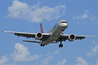 N543US @ LAX - Northwest Airlines N543US (FLT NWA337) from Detroit Metro Wayne County (KDTW) on final approach to RWY 24R. - by Dean Heald