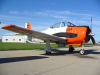 N2215D @ KRFD - North American T-28C - by Mark Pasqualino