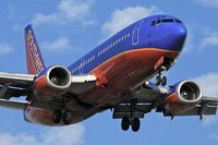 N659SW @ LAX - Southwest Airlines N659SW (FLT SWA756) from Norman Y Mineta San Jose Int'l (KSJC) on final approach to RWY 24R. - by Dean Heald