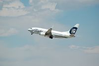 N615AS @ DEN - Alaska Air departing West at Denver International - by John Little