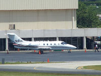 N132QS @ KPDK - Tied down @ Signature Flight Services (Long range photo - pardon image) - by Michael Martin