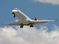 N740EV @ KLAS - Atlantic Southeast Airlines - (Delta) - 'Silver & Soaring' / 2004 Bombardier Inc CL-600-2C10 - by SkyNevada - Brad Campbell