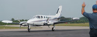 N808TW @ DAN - Guy guides 1977 Cessna 340A in front of General Aviation in Danville Va. - by Richard T Davis