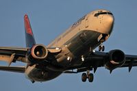 N393DA @ LAS - Delta Airlines N393DA (FLT DAL1767) from Cincinnati Northern Kentucky Int'l (KCVG) on final approach to RWY 25L. - by Dean Heald