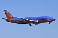 N331SW @ LAX - Southwest Airlines N331SW (FLT SWA1385) from Metropolitan Oakland Int'l (KOAK) on short-final to RWY 24R. - by Dean Heald